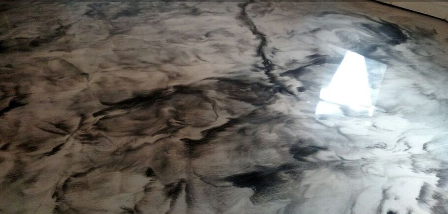 Basement floor in epoxy with a metallic finishe. Work done by Epoxy Floor Gastonia Pros.